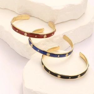 Three-piece set of enamel star-embossed open bangles in red, navy, and black gold plating