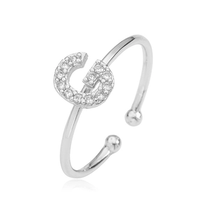 Detailed view of silver open ring with letter C cubic zirconia and bead ends