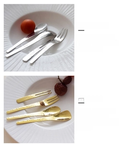 Detail view of 304 stainless steel spoons and forks with Japanese hammered texture