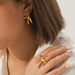 Ocean style gold starfish open ring and earrings set in polished stainless steel