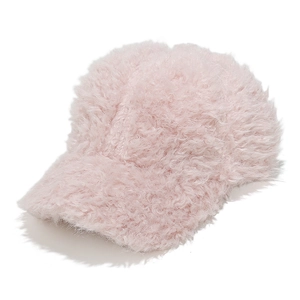 Detail of soft pink plush baseball cap showing fluffy faux fur texture and material