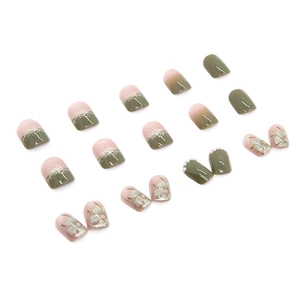 Elegant camellia press-on nails with pearl accents and olive green floral gradient design