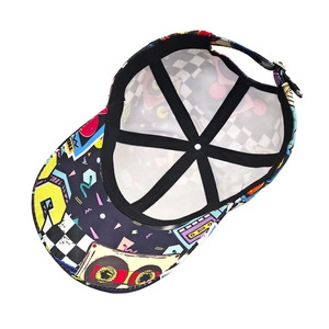 Retro 90s baseball cap with graffiti print showing inner structure and metal buckle
