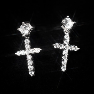 Elegant S925 silver Baroque cross earrings with shimmering white crystals on dark background