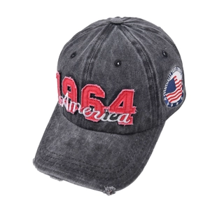 Detailed close-up of 1964 America embroidery on vintage washed cotton baseball cap