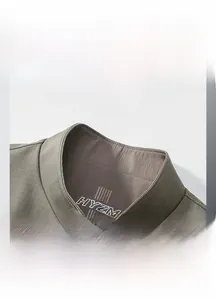 Detailed macro view of olive green stand collar with metal zipper and durable fabric texture