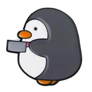 Detailed view of a funny cartoon penguin enamel pin holding a knife accessory