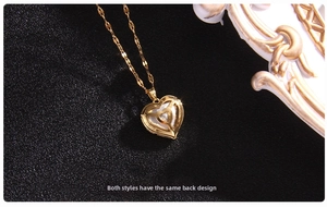 Detailed back view of golden heart pendant showing the metallic structure and fine chain