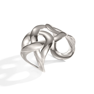 Macro view of a silver open cuff bracelet with intricate hollow woven celtic knot design