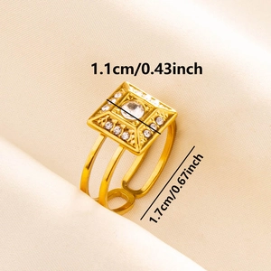 Detail view of gold geometric ring with zircon inlay and sizing measurements