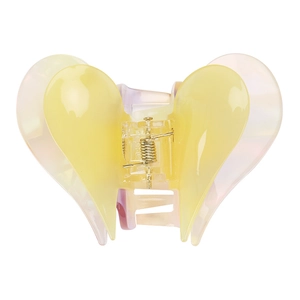 Detail of a translucent gradient heart hair claw clip with a durable metal spring