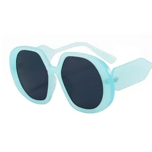 Fashionable oversized square sunglasses with translucent light blue frame and dark lenses