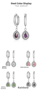 Close-up of teardrop zircon earrings in purple, white, pink, green and rainbow colors