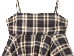 Detail of plaid camisole top with thin straps and vintage black-brown checkered pattern