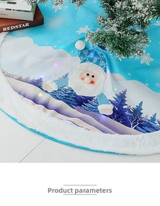 Detail of blue plush Christmas tree skirt with LED lights and Santa Claus embroidery