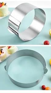 Detail of adjustable stainless steel mousse ring showing internal size scale markings
