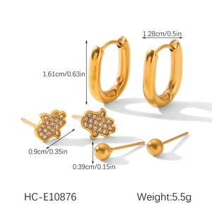 Three-piece gold earring set details with Hamsa hand studs and hoop size measurements