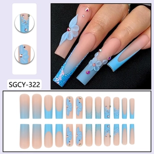 Long ballet press-on nails with blue gradient, 3D flowers and rhinestones decoration
