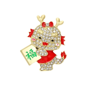 Golden dragon brooch with sparkling rhinestones and red enamel holding a Fu sign