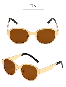 Détail de lunettes de soleil ovales en métal doré avec verres thé sous plusieurs angles