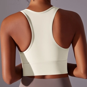 Detail of racerback sports bra in cream white with reinforced double stitching