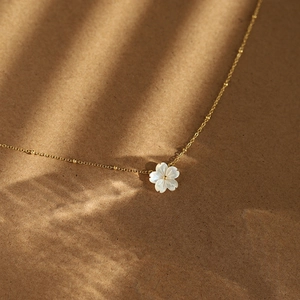 18K gold plated necklace with white shell peach blossom pendant and gold bead chain