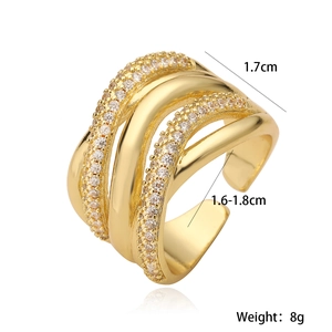 Macro shot of an adjustable 18K gold plated multi-layer ring with sparkling zircon stones