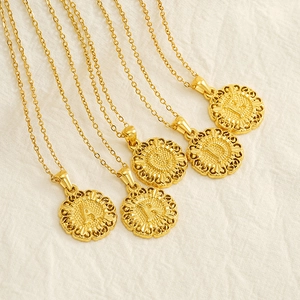 Titanium steel necklaces with round embossed letter pendants in vintage coin style