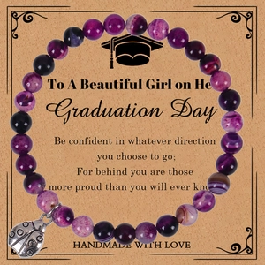 Purple agate beaded bracelet with silver ladybug charm on graduation gift card