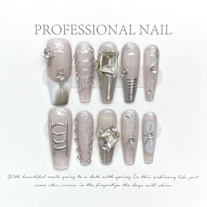 Handmade press-on nails set with purple glitter, square rhinestones and silver stars