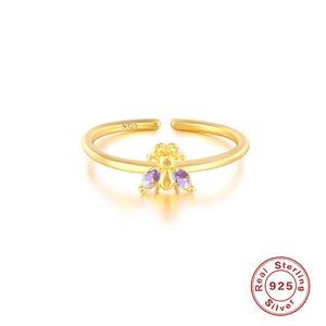 Minimalist S925 sterling silver bee ring with purple pear-cut zircon on white background
