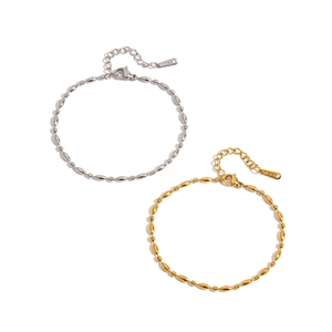 Elegant 18K gold and silver stainless steel beaded bracelet with lobster clasp