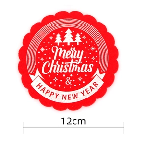 Detail of 12cm red felt Christmas coaster with Merry Christmas and snowflake patterns