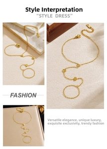 Detailed macro view of gold heart hand chain with crystals and delicate link structure