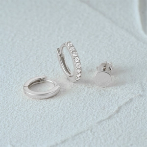 Detailed view of 925 sterling silver mini butterfly geometric earring and stud set