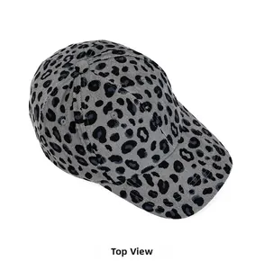 Top-down view of gray leopard print corduroy baseball cap showing fabric texture