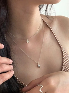 French style 925 silver floral necklace with blue stone and hammered star pendant