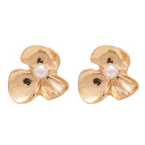 Elegant gold flower stud earrings with pearl centers and textured petals on white background