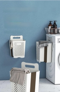 Collapsible wall-mounted and floor-standing laundry baskets for bathroom storage space