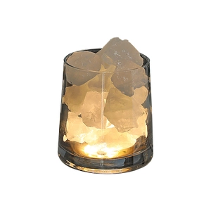 Essential oil diffuser lamp with white crystal stones and warm LED light base for home decor