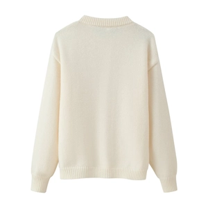 Rear view of a cream-colored knit cardigan showing ribbed cuffs and round neckline details