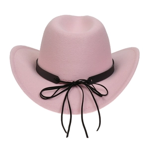Pink western cowboy hat detail featuring a black leather band and stylish fringe tassels