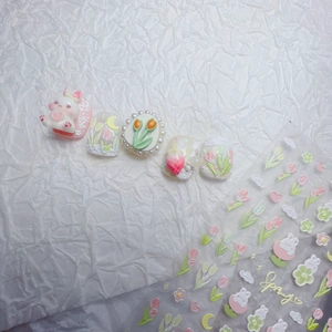 3D spring floral nail stickers with tulips and rabbits on white textured background