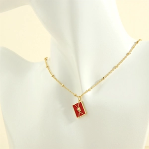 Fashionable 18K gold-plated envelope pendant necklace with red enamel heart detail