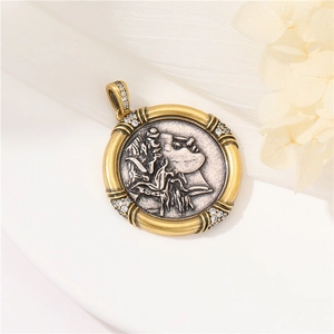 Detailed view of a Greek Roman portrait cameo pendant with gold frame and stone inlay