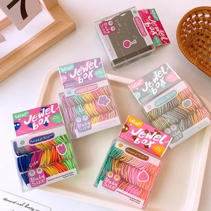 Assorted candy colored seamless high elastic hair ties in transparent baby size boxes
