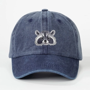 Vintage navy blue washed cotton baseball cap featuring embroidered raccoon animal graphic
