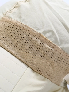 Macro shot of breathable mesh vent and precision stitching on quick-dry kids sun hat