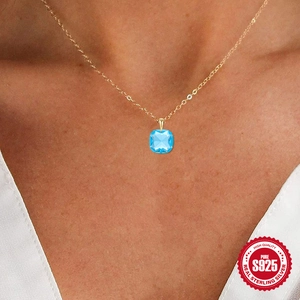 Elegant S925 sterling silver necklace with square cut blue sapphire pendant on a gold chain
