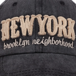 Washed black vintage baseball cap featuring New York Brooklyn embroidery and felt patches